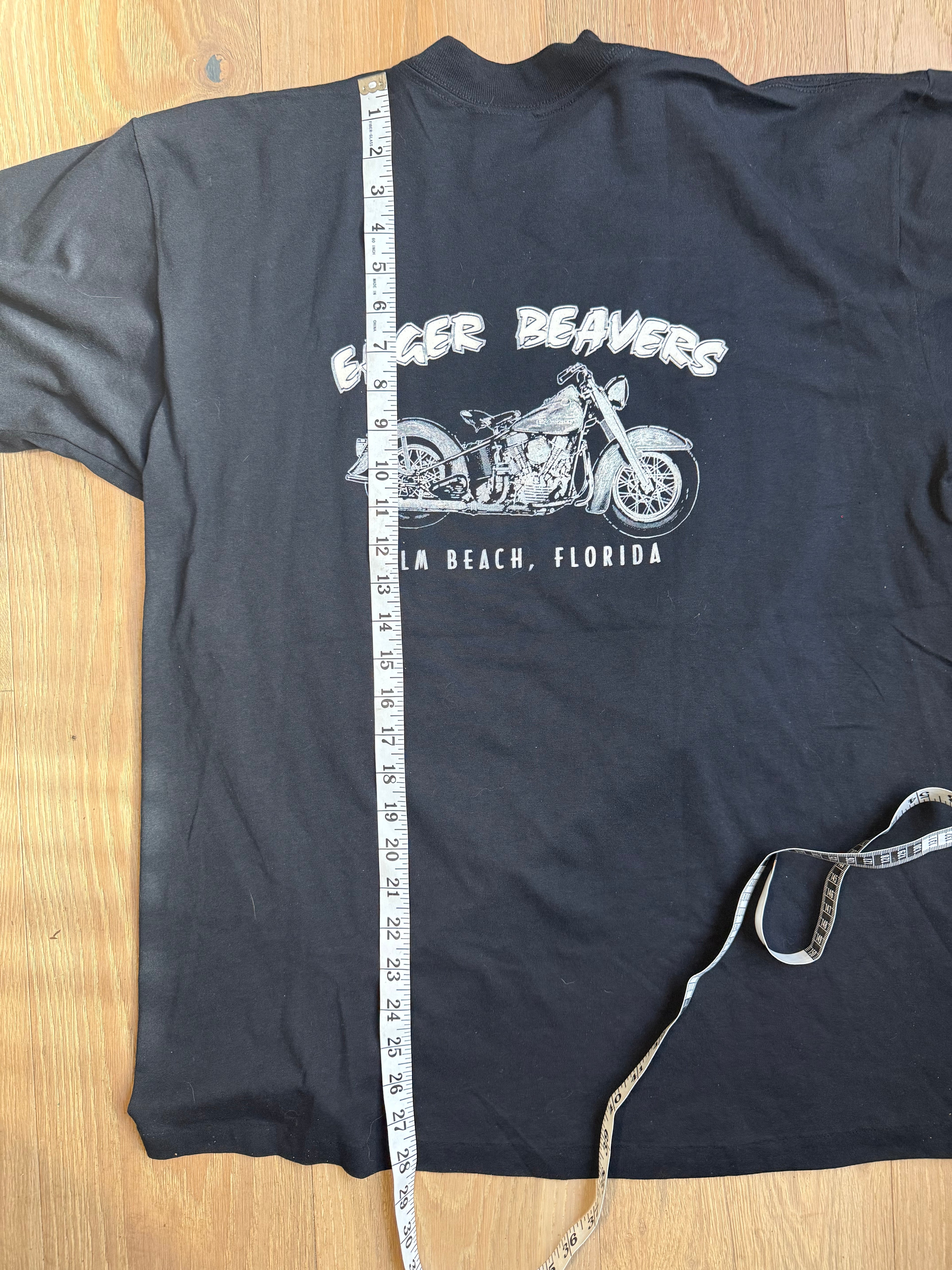 Vintage 3-D emblem T